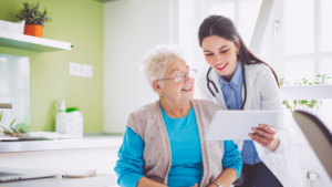 female doctor discusses health results with patient