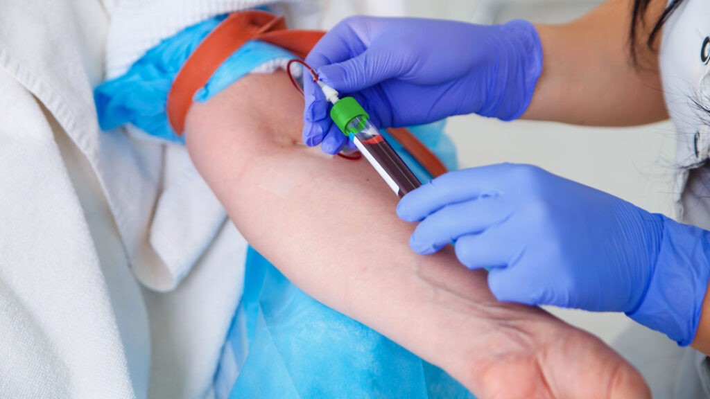 patient with a phlebotomist